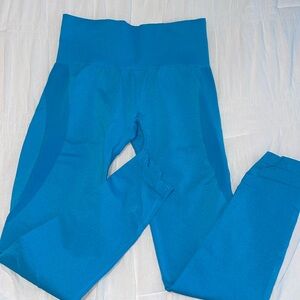 NVGTN leggings size medium in blue color
